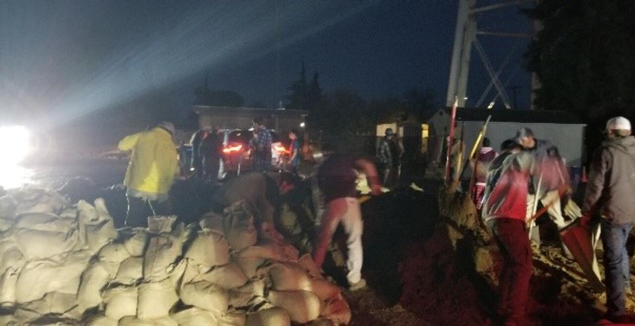 Community Volunteer Sandbag Brigade to Protect Residents from Climate-Induced Flooding, Merced, CA January 11, 2023 (Photo by Paul Almeida)